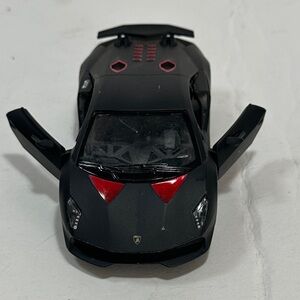 Lamborghini Sesto Elemento Sleek Black and Red Toy Sports Car
